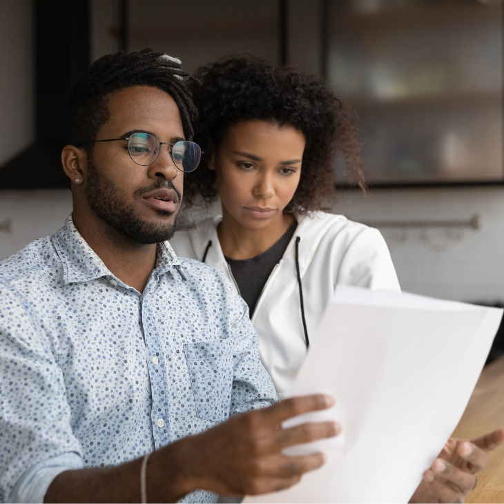 Couple reviews insurance information for reproductive care 